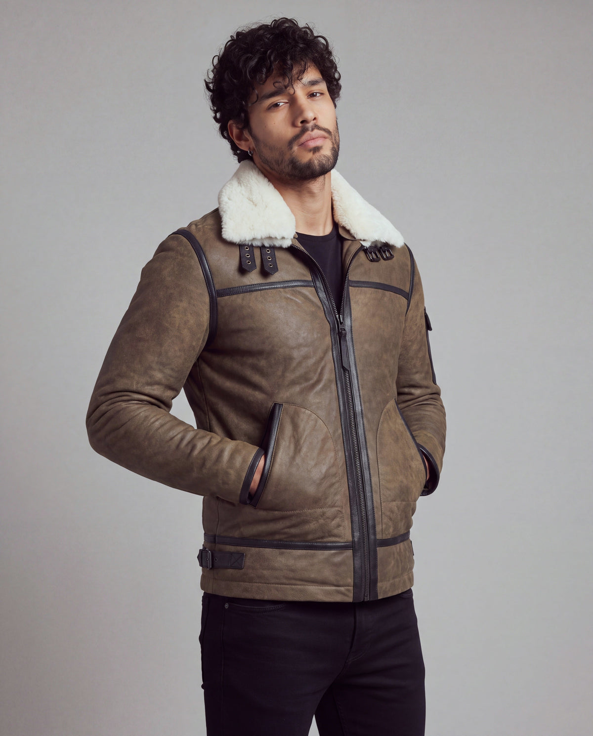 Forest by tigha – men's leather aviator jacket with double white shearling collar, olive-brown sheepskin in Elephant Vintage, three-quarter view, hand in pocket