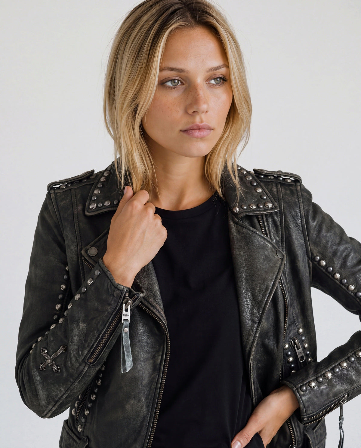 Jocy by tigha – women's studded leather biker jacket in cowhide, Stone Washed Black, close-up on model