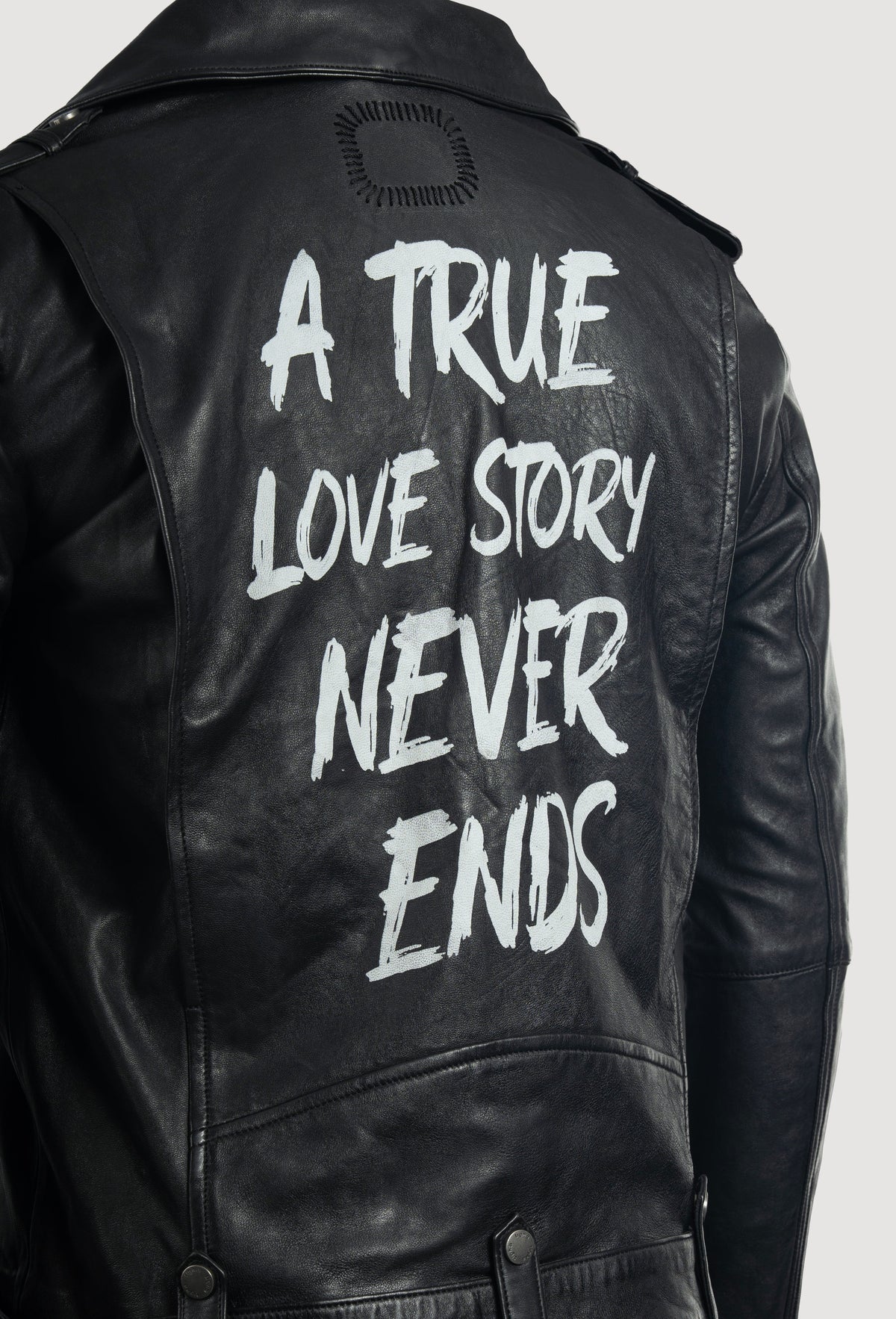 A True Love Story by tigha – men's signature leather biker jacket in sheepskin, Heavy Washed Black, Detail · lettering detail on the back