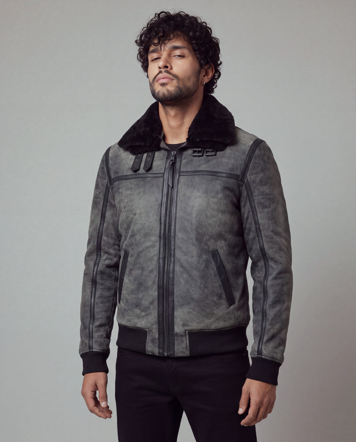 Talvi by tigha – men's leather aviator jacket with double shearling collar, sheepskin in Elephant Vintage Grey, three-quarter view on model