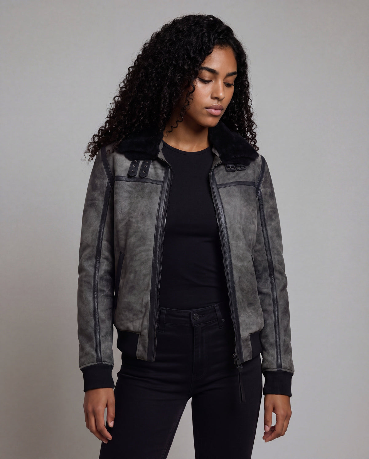Talvi by tigha – women's leather aviator jacket with double shearling collar, sheepskin in Elephant Vintage Grey, three-quarter view on model